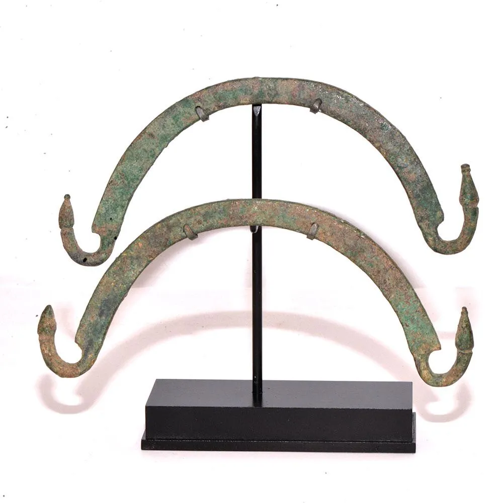 A Pair of Etruscan Bronze Situla Handles, ca. 4th century BCE