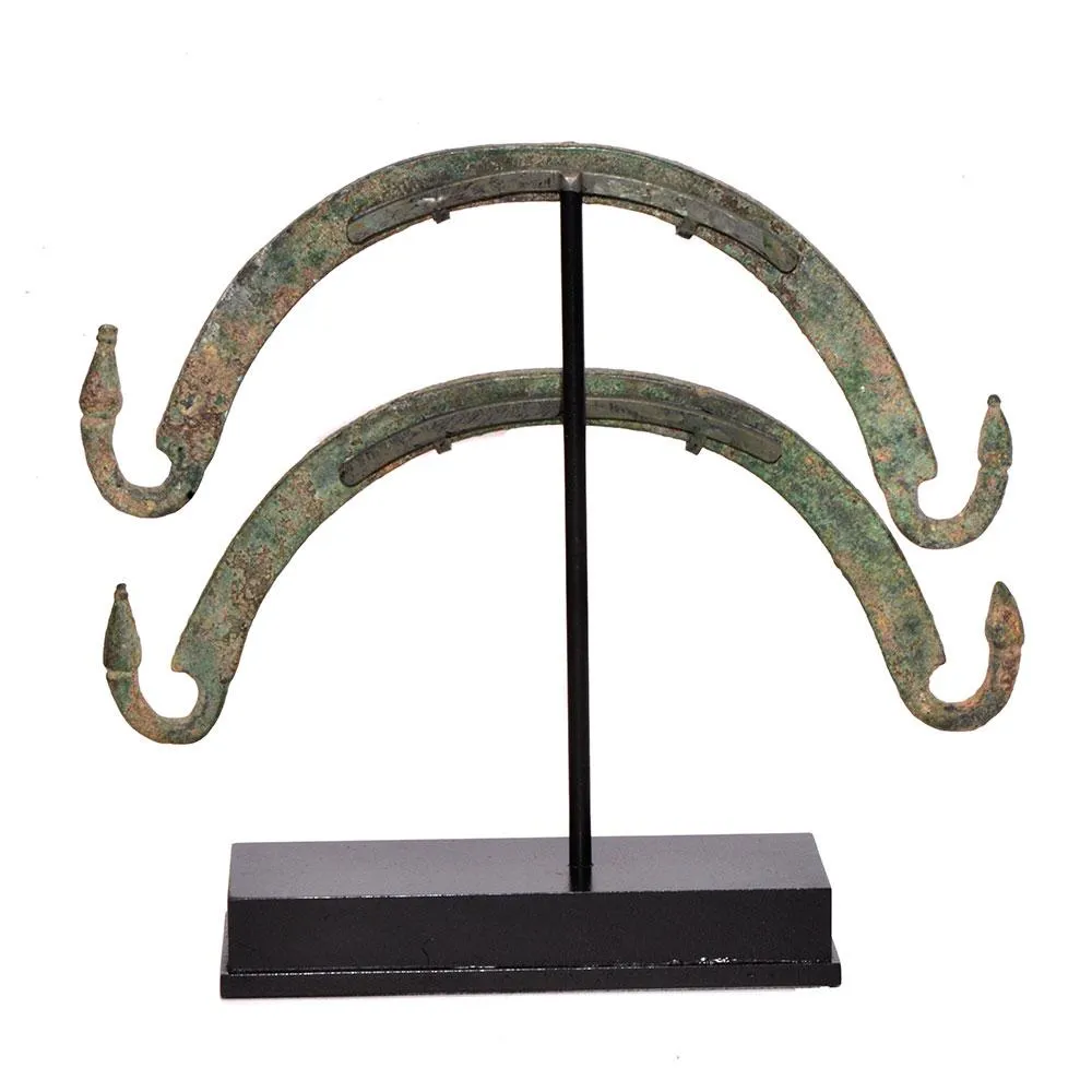 A Pair of Etruscan Bronze Situla Handles, ca. 4th century BCE