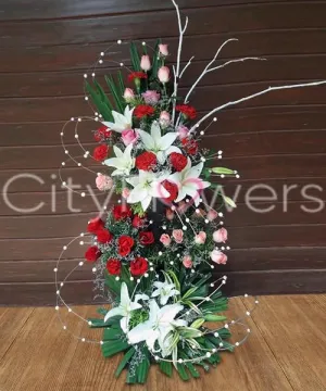 A STANDING GESTURE OF LUXURIOUS FLOWERS
