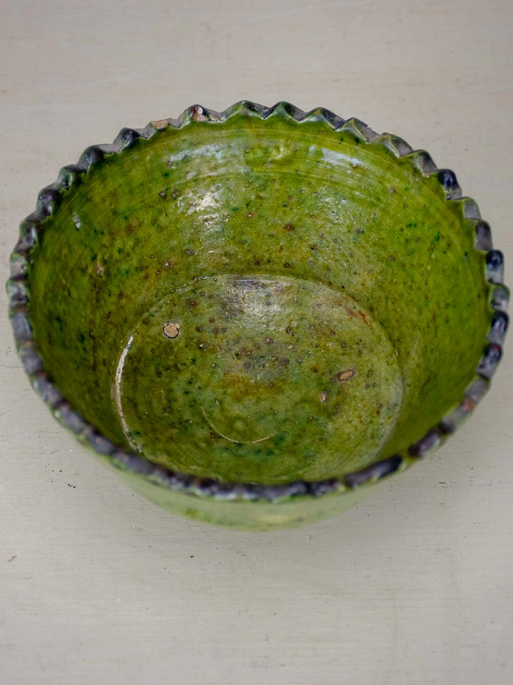 Antique French nut bowl with green glaze