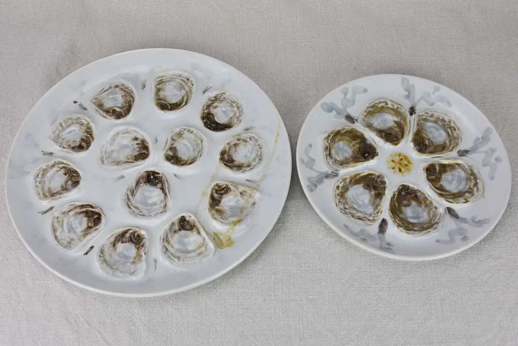 Collection of 10 French oyster plates and platter - hand painted