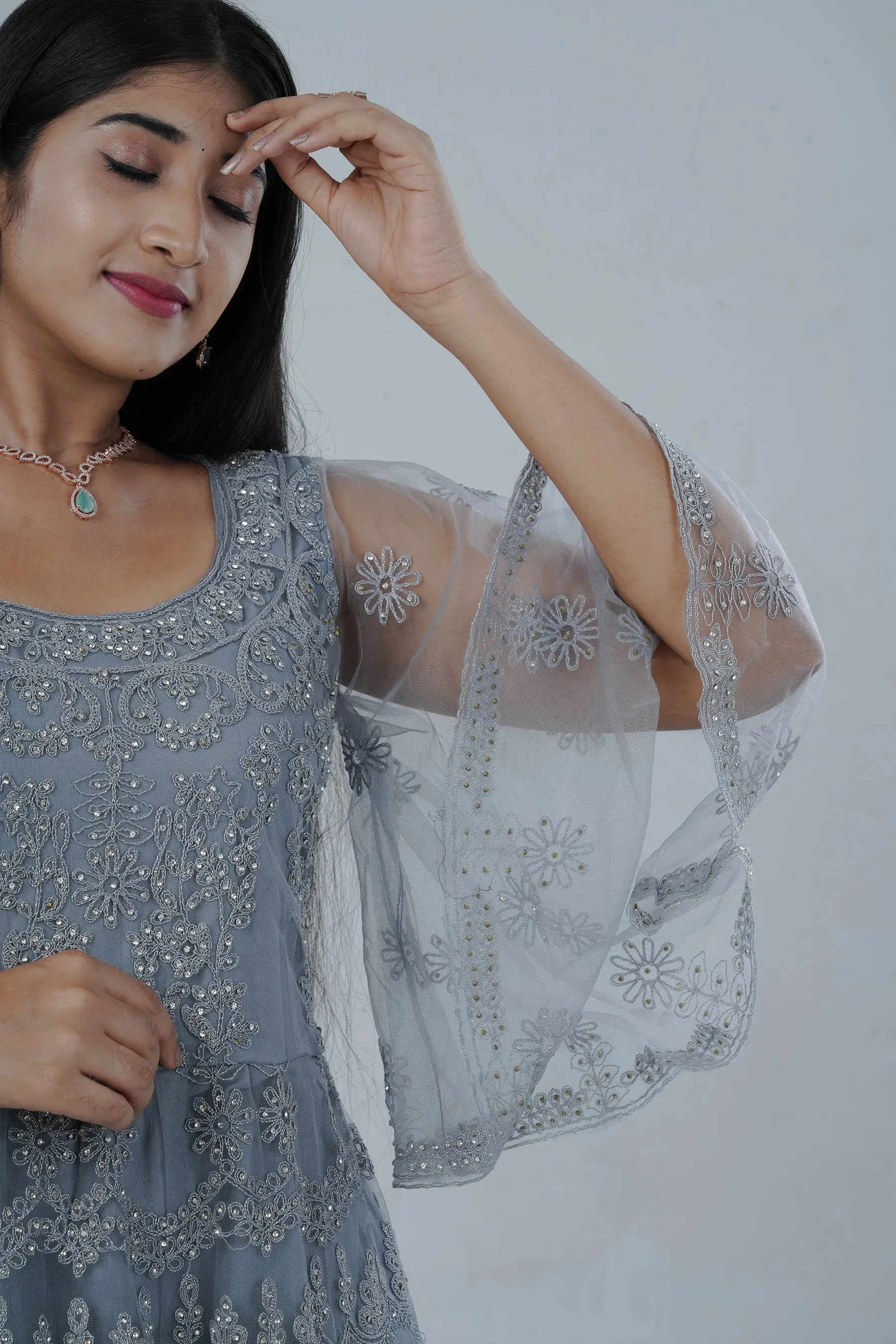 Luxurious Embroidered Long Gown with Stone Work