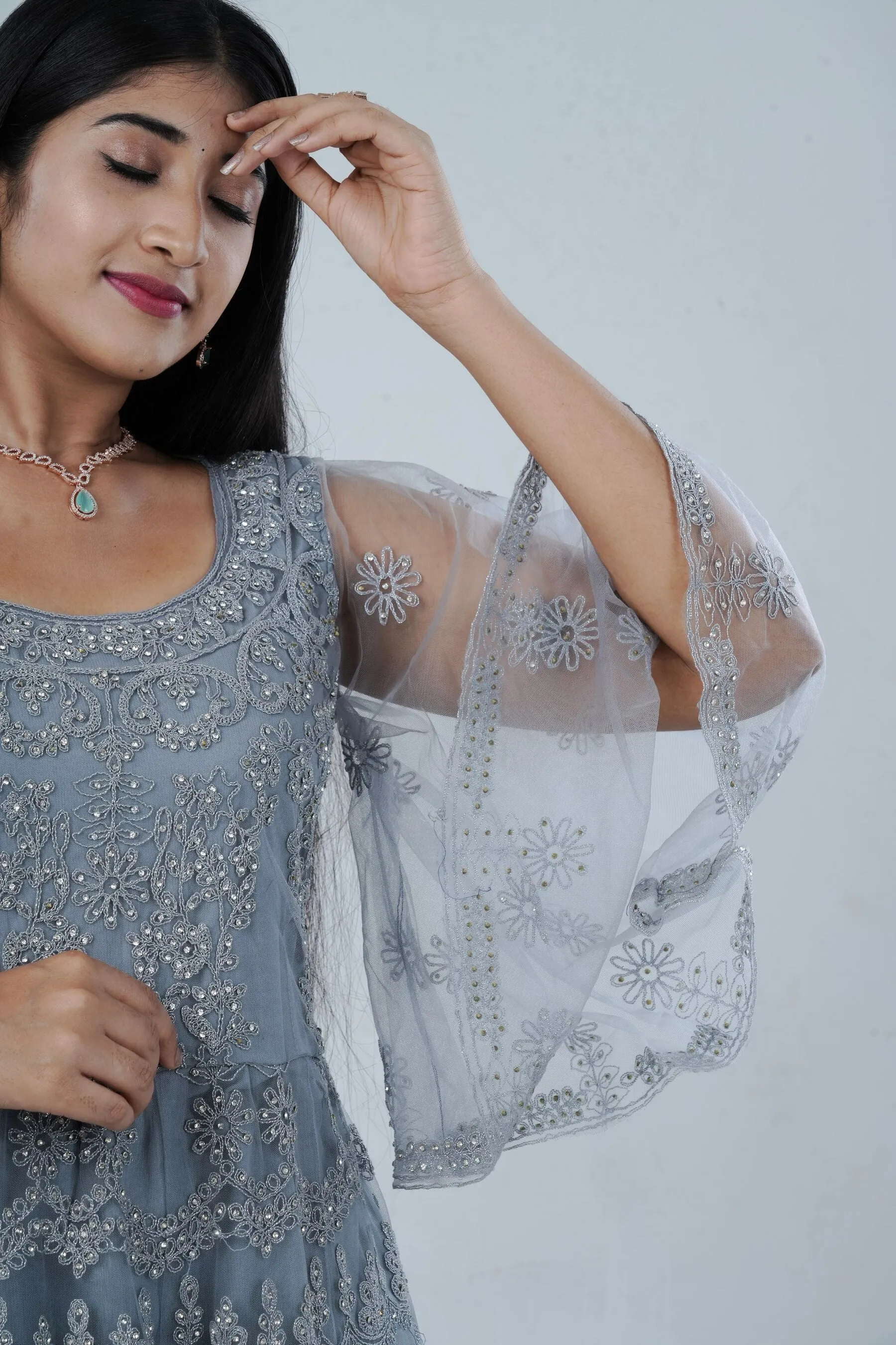 Luxurious Embroidered Long Gown with Stone Work