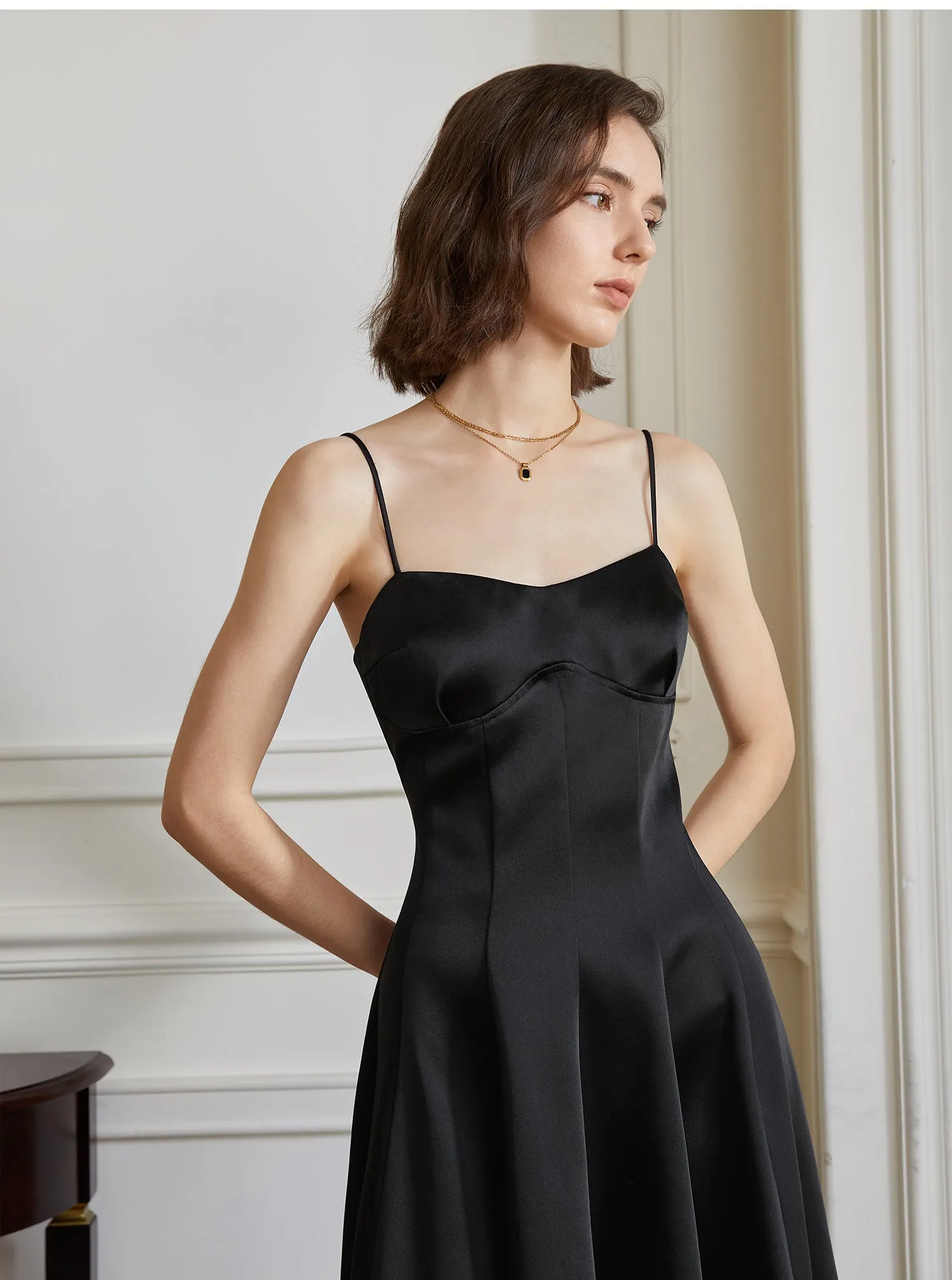 Luxurious satin, a striking sleeveless, silhouette dress- Celina
