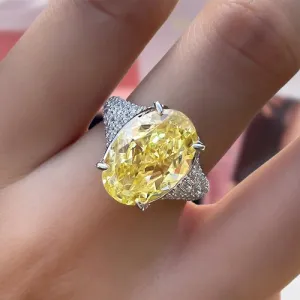 Luxurious Yellow Sapphire Oval Cut Diamond Engagement Ring