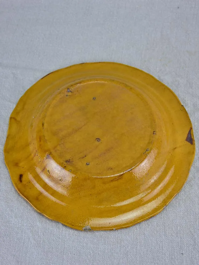Set of seven mid century bowls with orange glaze 9½"