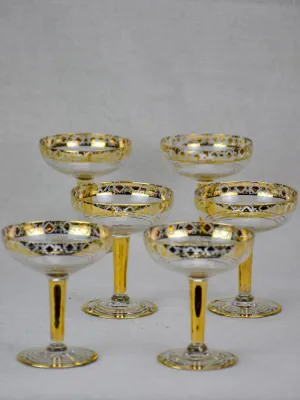Six French champagne cups with gold decoration