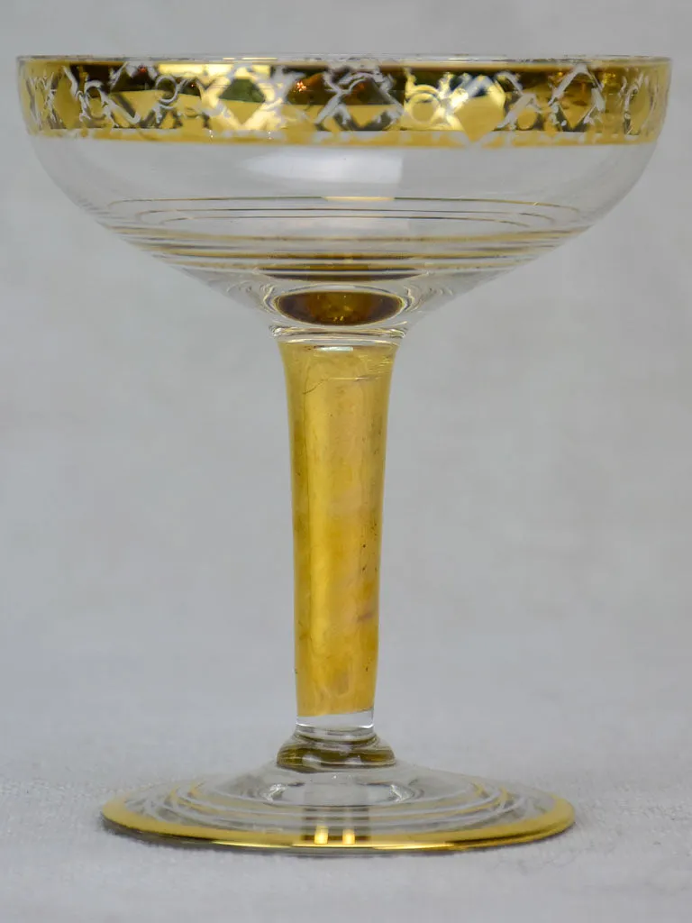 Six French champagne cups with gold decoration