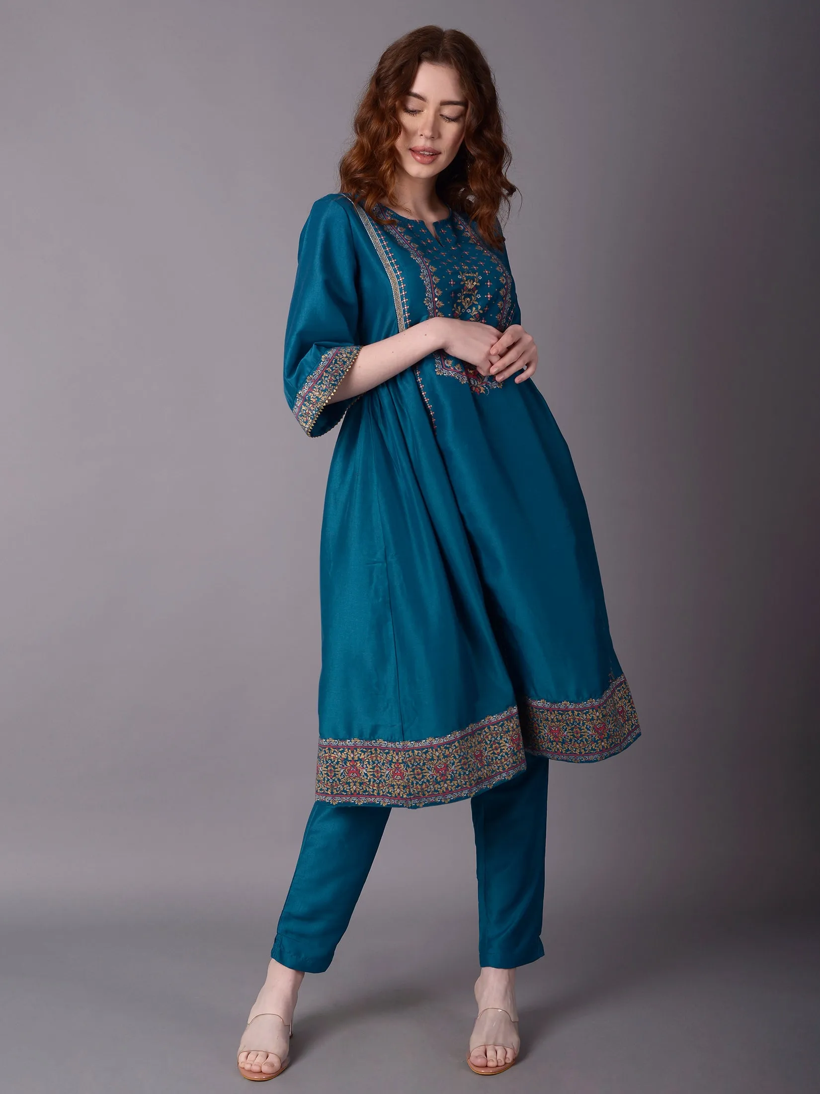 Women Turquoise Blue Ornamental Print Kurta With Trouser
